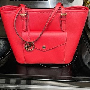 Michael Kors red handbag